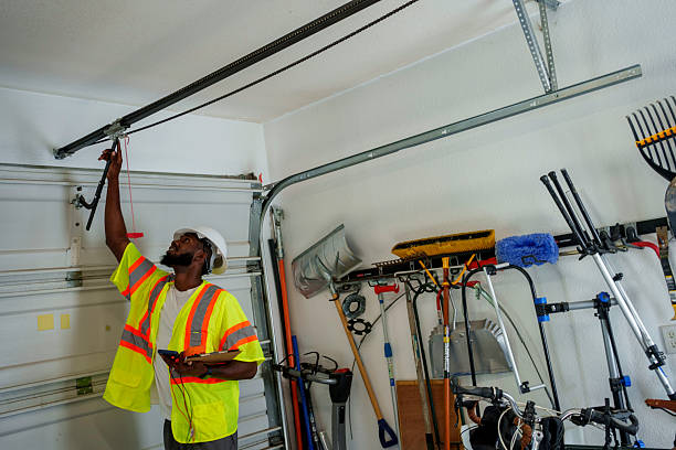 Professional Garage Door technician working in First Mesa, AZ